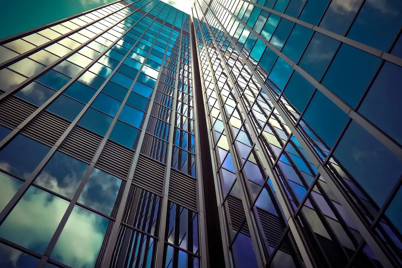 Glass office building seen from below